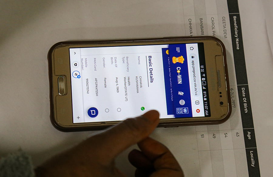 : Chhaya, a health worker, uploads her details on an app during the dry run of COVID-19 vaccination, at Sanjay Gandhi Postgraduate Institute of Medical Sciences in Lucknow, Saturday, Jan. 02, 2021. Credit: PTI Photo
