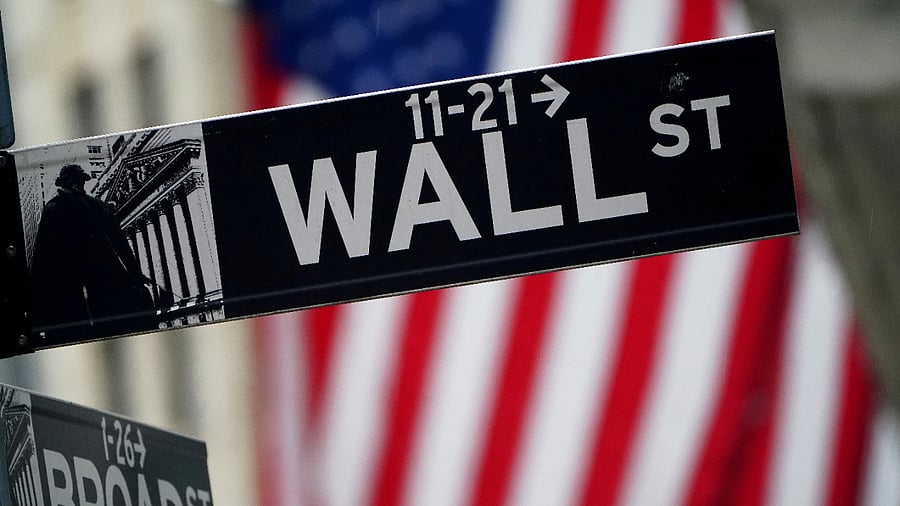 A Wall Street sign is pictured outside the New York Stock Exchange in the Manhattan borough of New York City, New York, US. Credit: Reuters File Photo