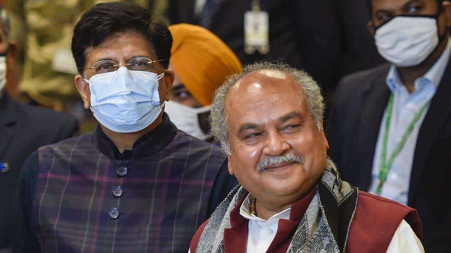 Union Minister for Agriculture and Farmers' Welfare Narendra Singh Tomar with Minister for Commerce and Industry Piyush Goyal addresses a press conference after the 11th round of talks with farmers' representatives on new farm laws. Credit: PTI Photo
