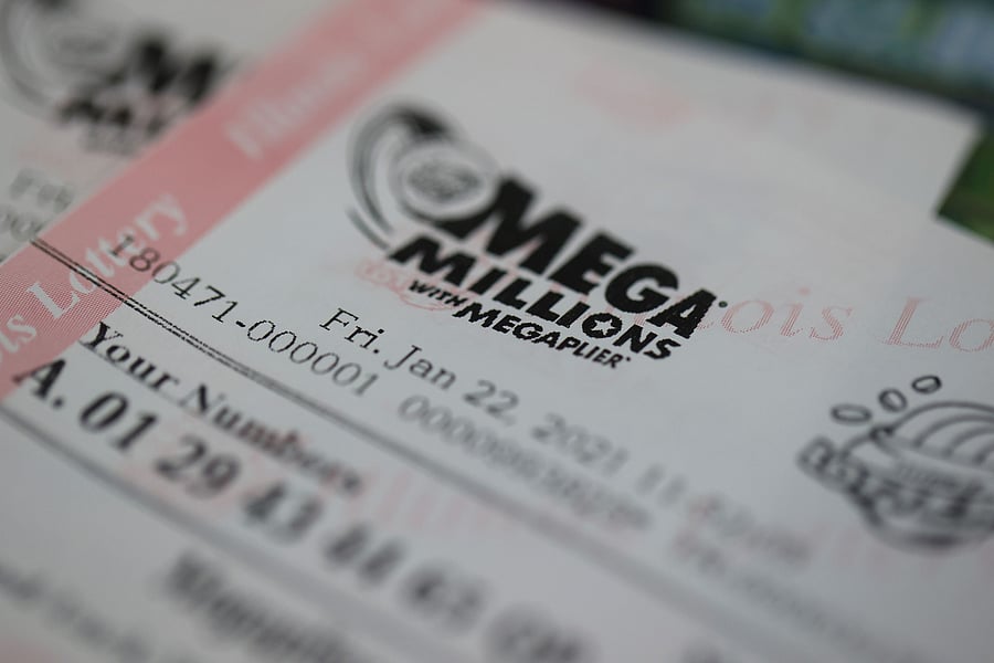Mega Millions lottery tickets are sold at a 7-Eleven store in the Loop on January 22, 2021 in Chicago, Illinois. The jackpot in the drawing has climbed to $970 million, the third highest in the game's history. Credit: AFP Photo