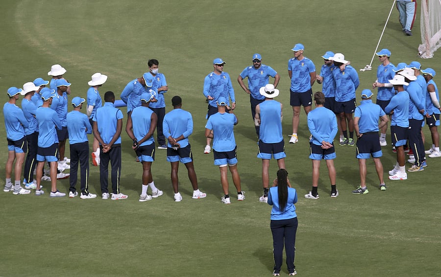 Players of South Africa cricket team attend a team meeting prior a practice session at the National Cricket Stadium, in Karachi, Pakistan. Credit: AP.