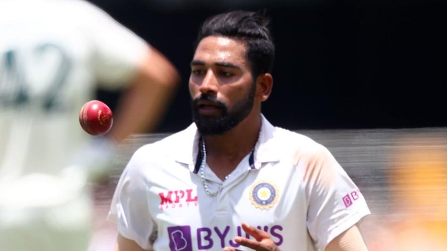India's paceman Mohammed Siraj gets ready to bowl on day four of the fourth cricket Test match between Australia and India at The Gabba in Brisbane on January 18, 2021. Credit: AFP Photo