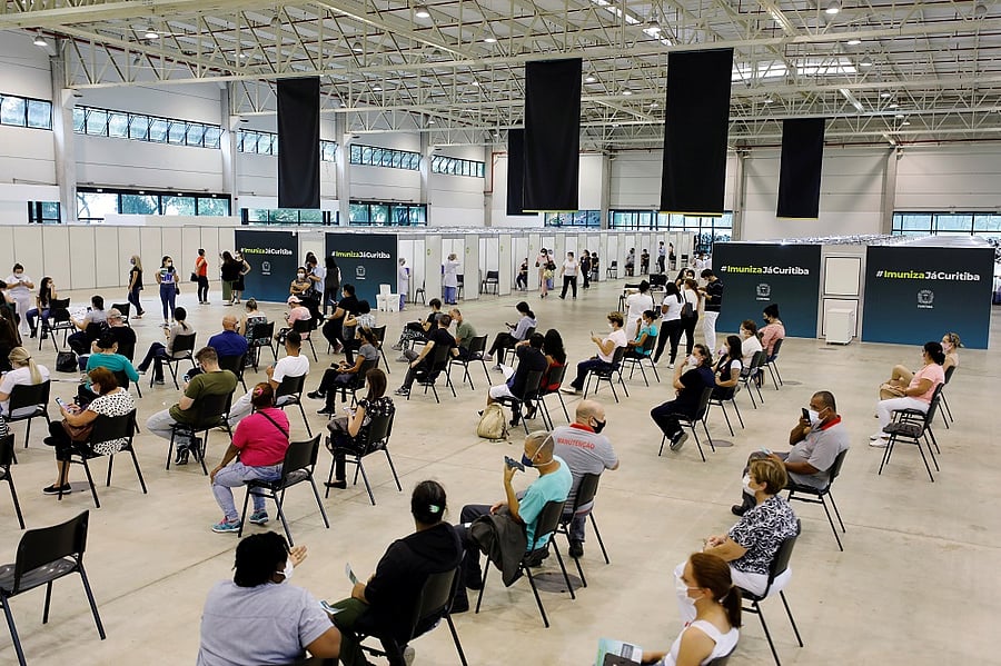 Healthcare workers wait before receiving the first dose of the Sinovac's CoronaVac coronavirus. Credit: Reuters Photo