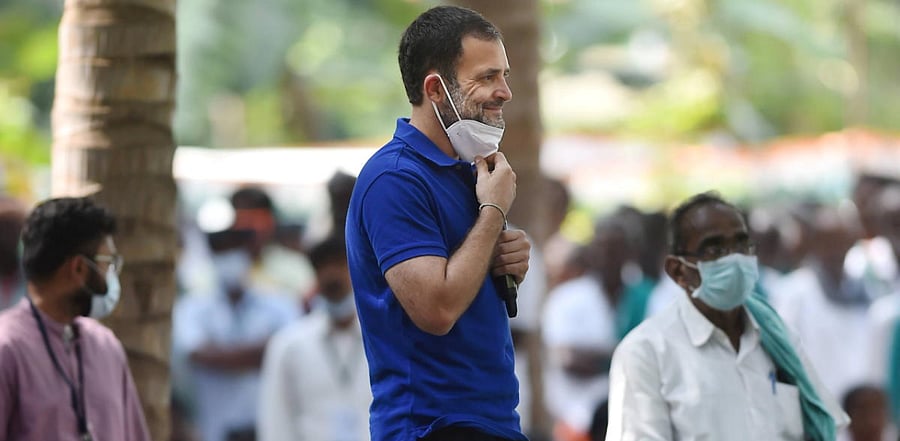 Congress leader Rahul Gandhi interacts at a 'Farmers Convention', during his election campaign for the forthcoming Tamil Nadu Assembly polls, at Vangal Marigoundan Palayam in Karur. Credit: PTi Photo
