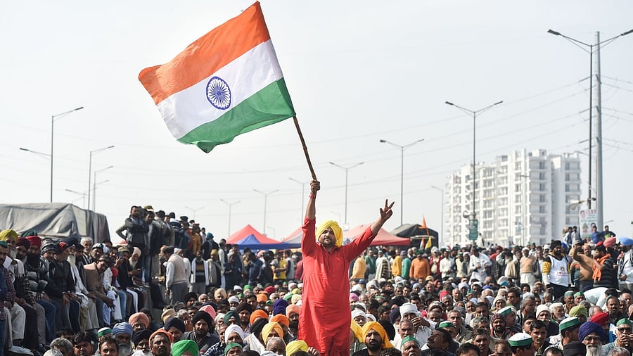 Farmers during their protest over Centre's farm reform laws, at Ghazipur border in New Delhi, Saturday. Credit: PTI Photo