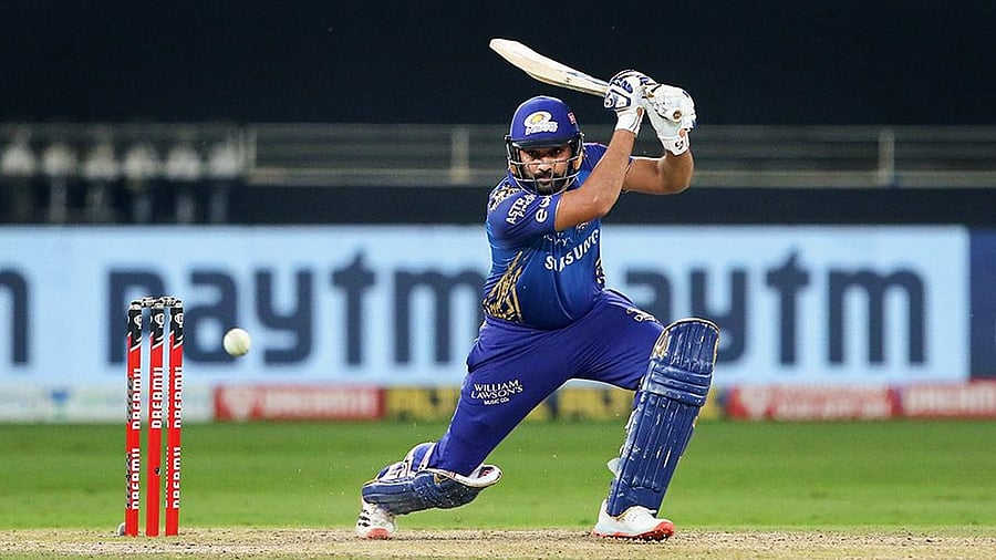 Mumbai Indians batsman Rohit Sharma plays a shot during the Indian Premier League (IPL) T20 final cricket match against Delhi Capitals, at Dubai International Cricket Stadium in Dubai. Credit: PTI Photo