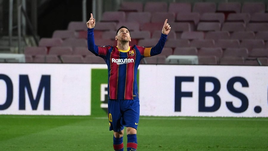 Barcelona's Argentinian forward Lionel Messi celebrates after scoring a goal during the Spanish league football match FC Barcelona against Athletic Club Bilbao at the Camp Nou stadium in Barcelona. Credit: AFP Photo