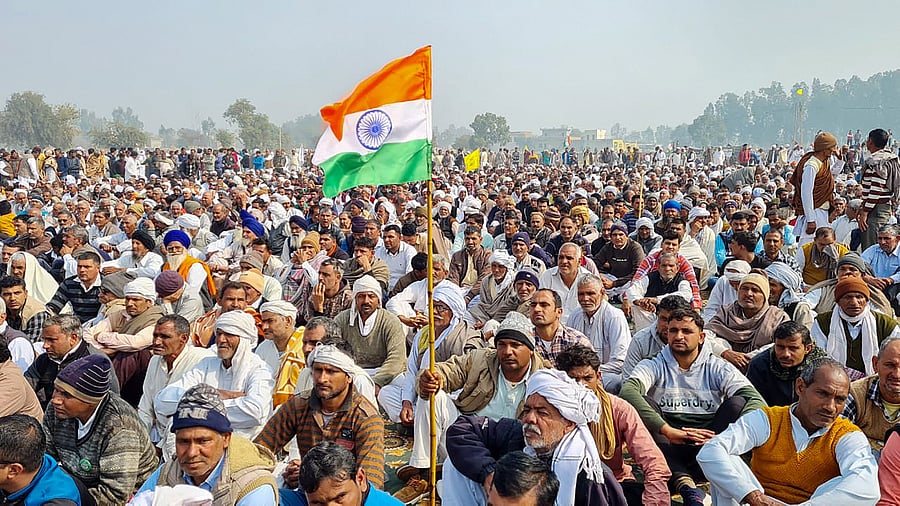 Farmers during 'Kisan Mahapanchayat' against the new farm laws, in Jind district. Credit: PTI Photo
