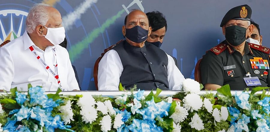 Defence Minister Rajnath Singh along with Karnataka CM BS Yediyurappa and CODS Gen Bipin Rawat during the inaugural ceremony of Aero India 2021 show, in Bengaluru. Credit: PTI Photo