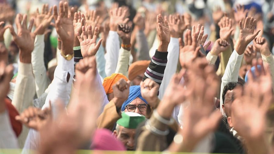 Farmers during their ongoing protest against the new farm laws, at Ghazipur border in New Delhi, Tuesday, Feb. 02, 2021. Credit: PTI Photo