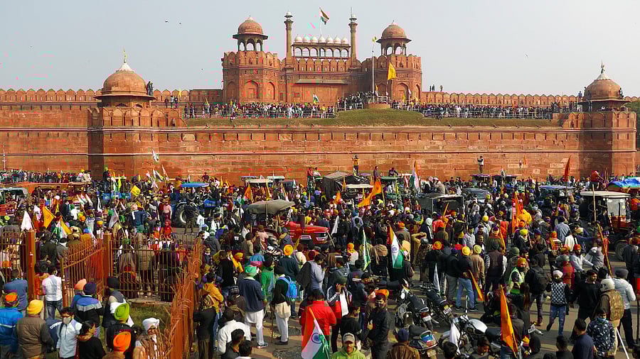 Farmers gather in front of the historic Red Fort during a protest against farm laws. Credit: Reuters Photo