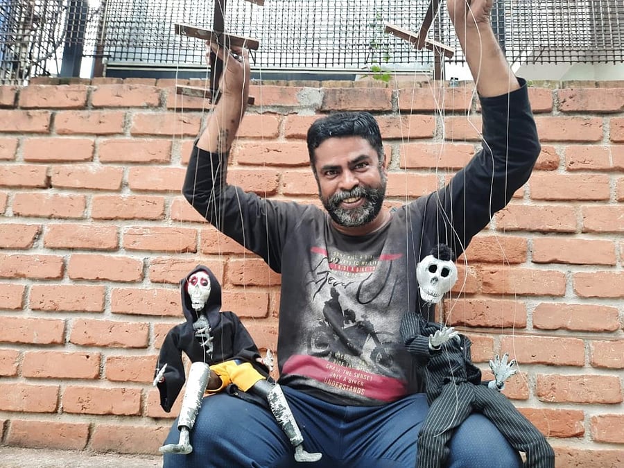 Chandru Shekar holds up Macha 1 and Macha 2 (right)