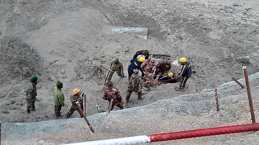 Officials carry out search and rescue operation at Tapovan Tunnel, after a glacier broke off in Joshimath in Uttarakhand’s Chamoli district. Credit: PTI Photo