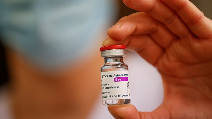 A member of the medical staff holds a vial of the AstraZeneca-Oxford Covid-19 vaccine, in Melun. Credit: Reuters Photo