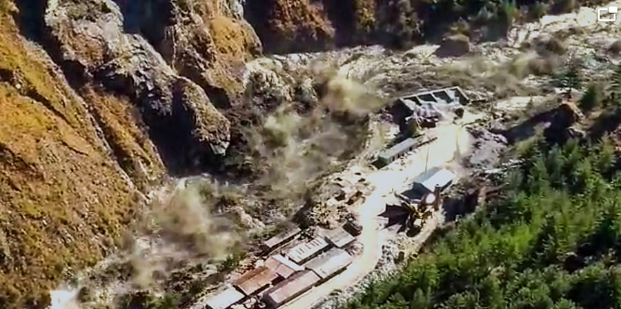 Avalanche after a glacier broke off in Joshimath in Uttarakhand’s Chamoli district causing a massive flood in the Dhauli Ganga river, Sunday, Feb. 7, 2021. More than 150 labourers working at the Rishi Ganga power project may have been directly affected. Credit: PTI Photo