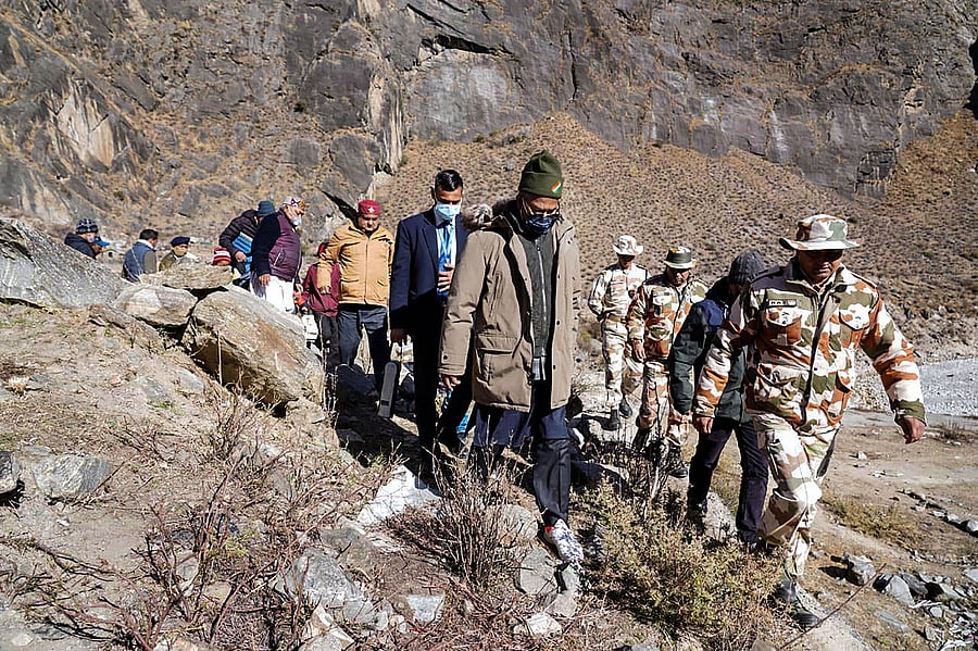 Uttarakhand Chief Minister Trivendra Singh Rawat visits the disaster-hit Raini village, after a glacier broke off at Joshimath in the Dhauli Ganga river, in Chamoli district of Uttarakhand, Tuesday, Feb. 9, 2021. Credit: PTI Photo