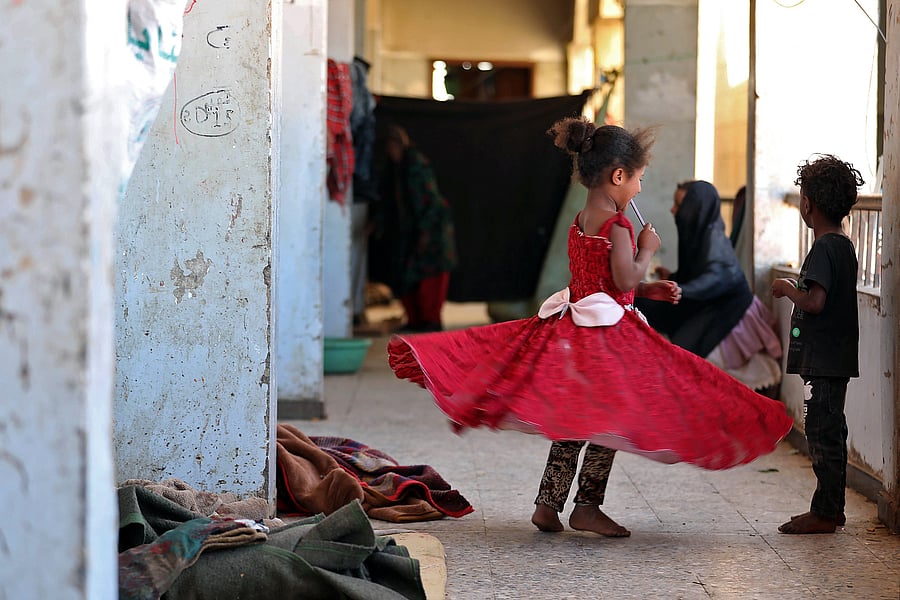 Children play inside a school building for displaced Yemenis who fled fighting between Huthi rebels and the Saudi-backed government forces, in the town of al-Turba in Taez governorate on February 4, 2021. Credit: AFP Photo