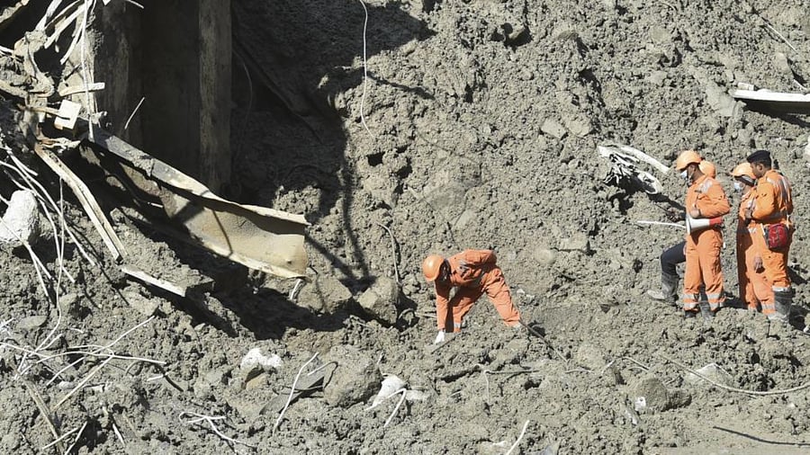 ITBP personnel carry out rescue and restoration work at Raini village, after a glacier burst on Feb. 7 in Joshimath triggered a flash flood, in Chamoli district of Uttarakhand, Sunday, Feb. 14, 2021. Credit: PTI Photo