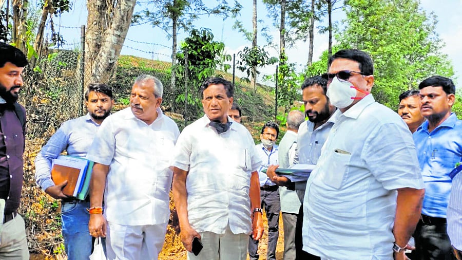 Urban Development Minister Byrathi Basavaraj inspects the development works in Madikeri.