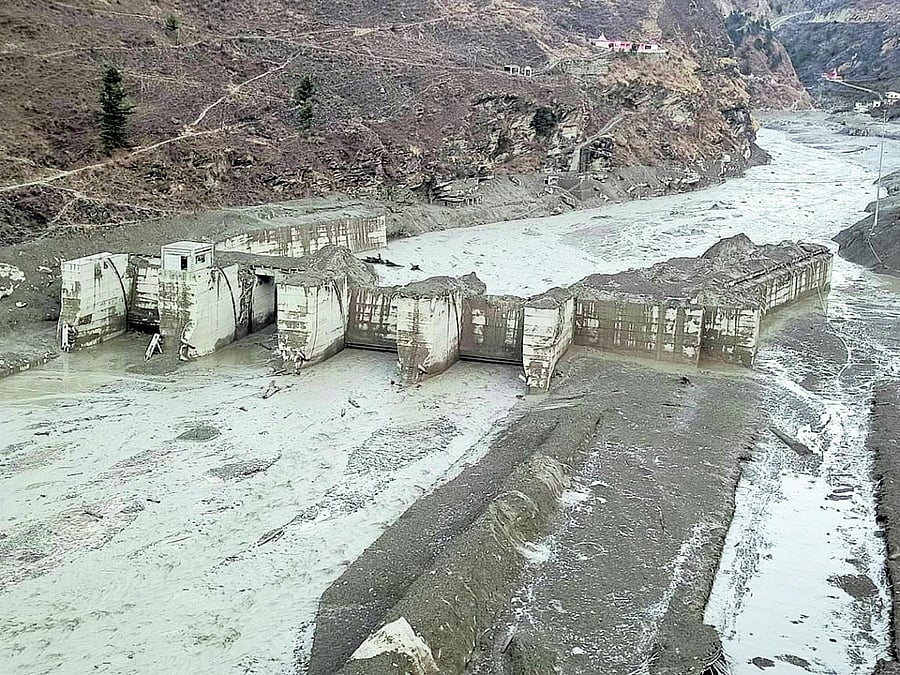 Damaged Dhauliganga hydropower project after a glacier broke off in Joshimath causing a massive flood in the Dhauli Ganga river, in Chamoli district of Uttarakhand, Sunday, Feb. 7, 2021. Credit: PTI Photo