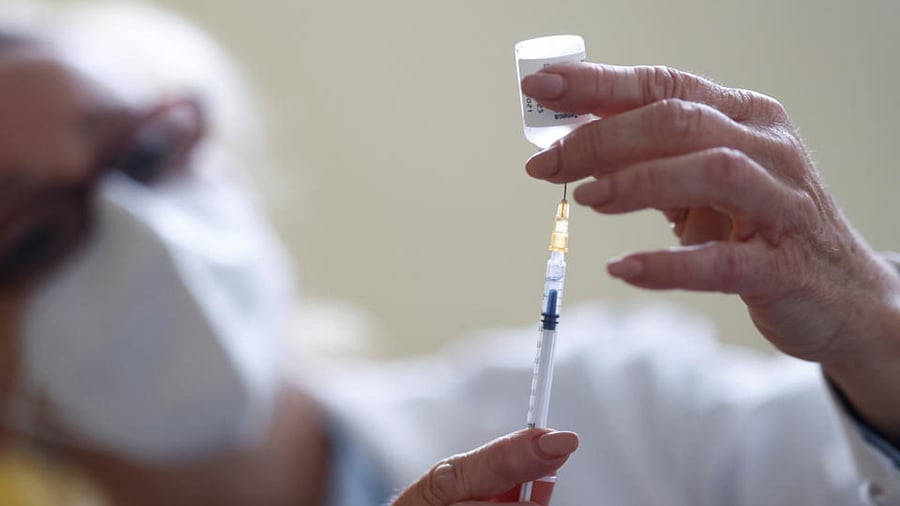 A nurses fills a syringe with a dose of the Oxford-AstraZeneca COVID-19 vaccine at a coronavirus disease (COVID-19) vaccination center in La Baule, France, February 17, 2021. Credit: Reuters Photo
