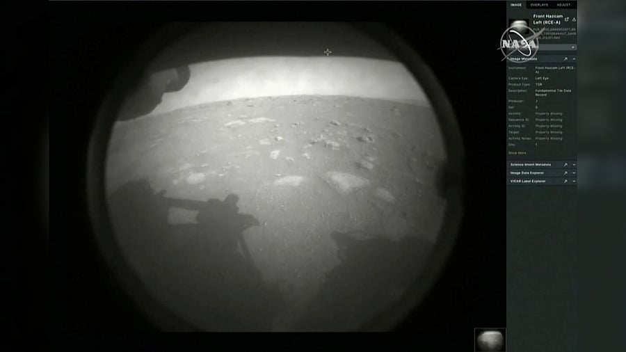The first images arrive moments after NASA?s Perseverance Mars roverspacecraft successfully touched down on Mars, at NASA's Jet Propulsion Laboratory in Pasadena, California, U.S. February 18, 2021.  Credit: Reuters Photo