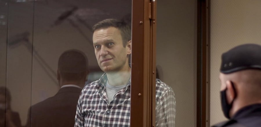 Russian opposition leader Alexei Navalny attends a hearing to consider an appeal against an earlier court decision to change his suspended sentence to a real prison term, in Moscow. Credit: Reuters Photo