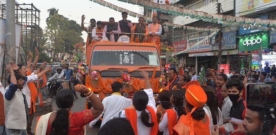 Bharatiya Janata Party (BJP) party activists take part in a political rally in Siliguri on February 20, 2021 ahead of West Bengal's Legislative Assembly election. Credit: AFP Photo