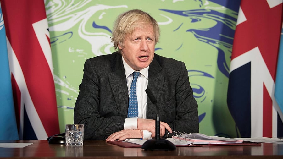 Prime Minister Boris Johnson chairs a session of the UN Security Council on climate and security at the Foreign, Commonwealth and Development Office in London. Credit: Reuters Photo