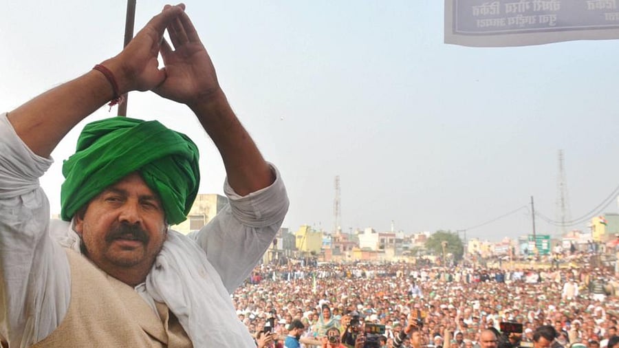 BKU (Tikait) President Naresh Tikait greets public during a Kisan Panchayat at Bilari in Moradabad, Friday, Feb. 12, 2021. Credit: PTI Photo