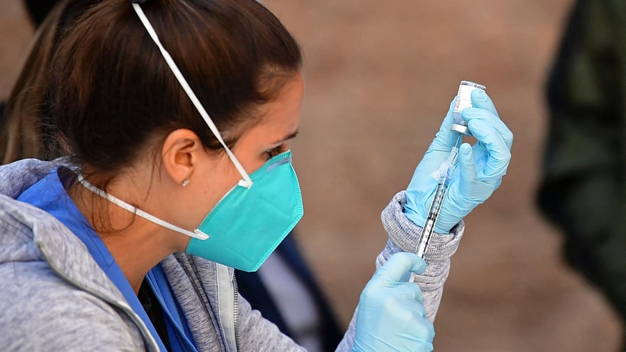 Moderna Inc said on Wednesday it is working with US government scientists to study an experimental booster shot that targets a concerning new variant of the coronavirus. Representative Image. Credit: AFP Photo