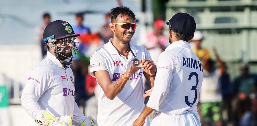 Axar Patel celebrates a wicket with teammates during the 4th day of the second cricket test match between India and England, at MA Chidambaram Stadium in Chennai. Credit: PTI Photo