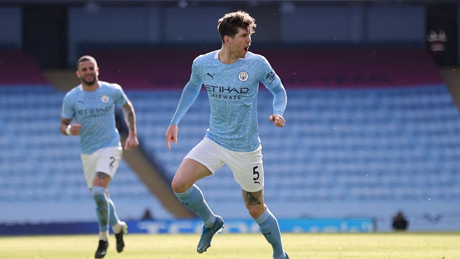 Manchester City's John Stones celebrates scoring their second goal in a 2-1 win over West Ham United in the English Premier League. Credit: Reuters Photo