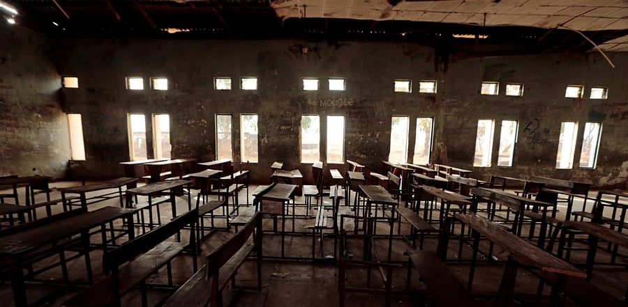 Classroom furniture is seen arranged inside the hall at the Government Science College in Kagara. Credit: Reuters Photo