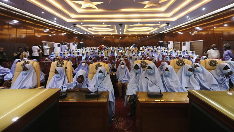 Girls who were kidnapped from a boarding school in the northwest Nigerian state of Zamfara, are seen after their release in Zamfara, Nigeria. Credit: Reuters.