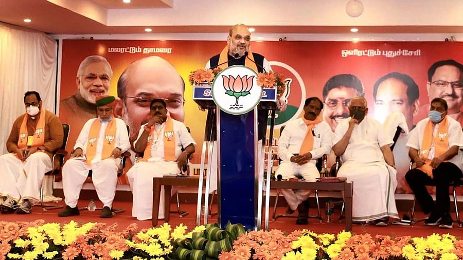 Union Home Minister and Senior BJP leader Amit Shah interacts with office bearers of BJP Puducherry in Karaikal. Credit: PTI/Twitter/@AmitShah.