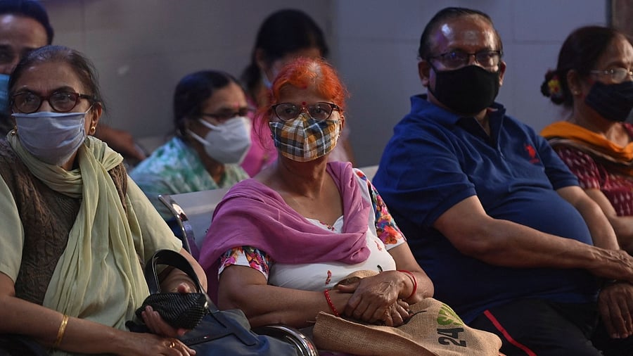 Senior citizens wait to be vaccinated with the Covid-19 coronavirus vaccine at a government hospital in Faridabad on March 4, 2021 as India continues the vaccination programme for senior people. Credit: AFP Photo
