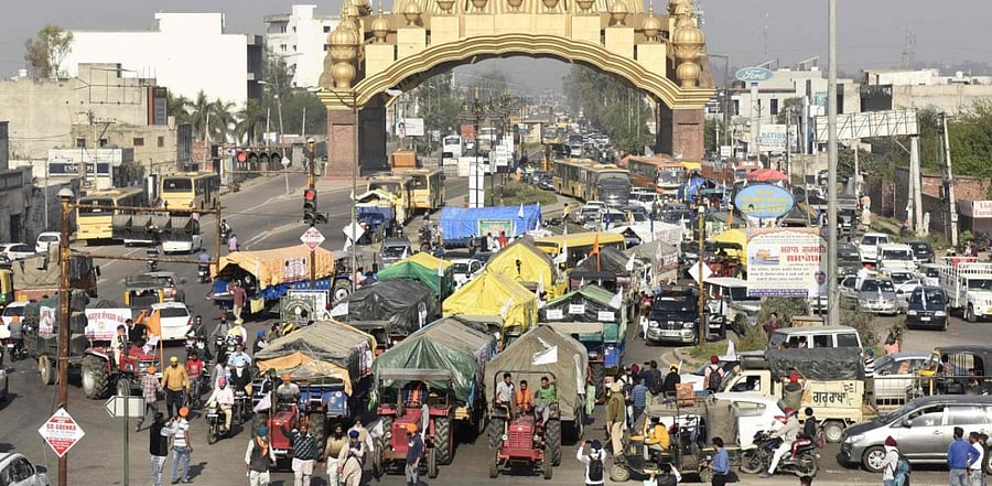 Farmers take part in a demonstration and move towards Delhi to join the farmers who are continuing their protest against the central government's recent agricultural reforms in Amritsar on March 5, 2021. Credit: AFP Photo