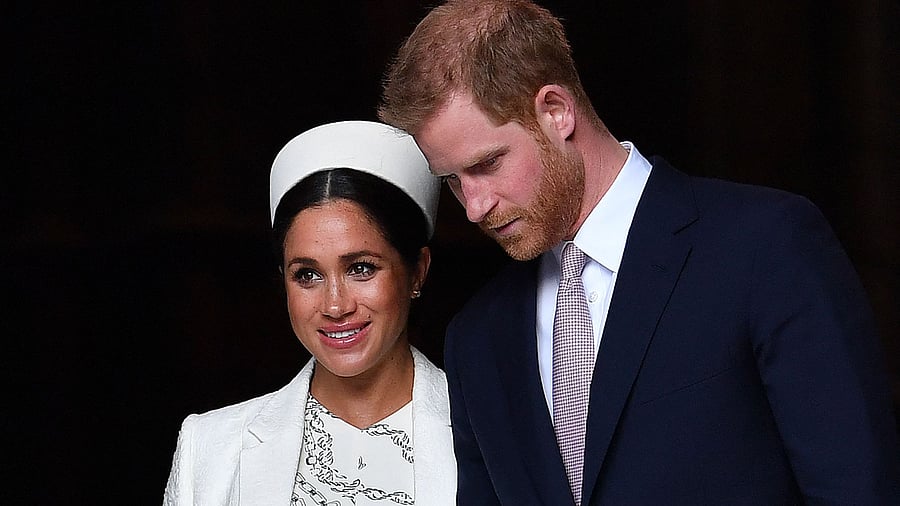 Britain's Prince Harry, Duke of Sussex (R) and Meghan, Duchess of Sussex. Credit: AFP Photo