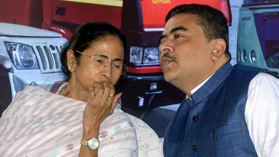 Undated photo of Trinamool Congress leader Suvendu Adhikari and Chief Minister Mamata Banerjee. Credit: PTI File Photo