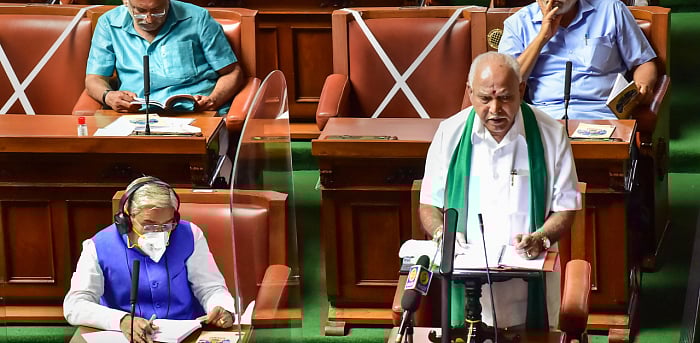 Karnataka Chief Minister B S Yediyurappa presents the State Budget 2021-22 in the Vidhana Soudha, Bengaluru. Credit: PTI Photo