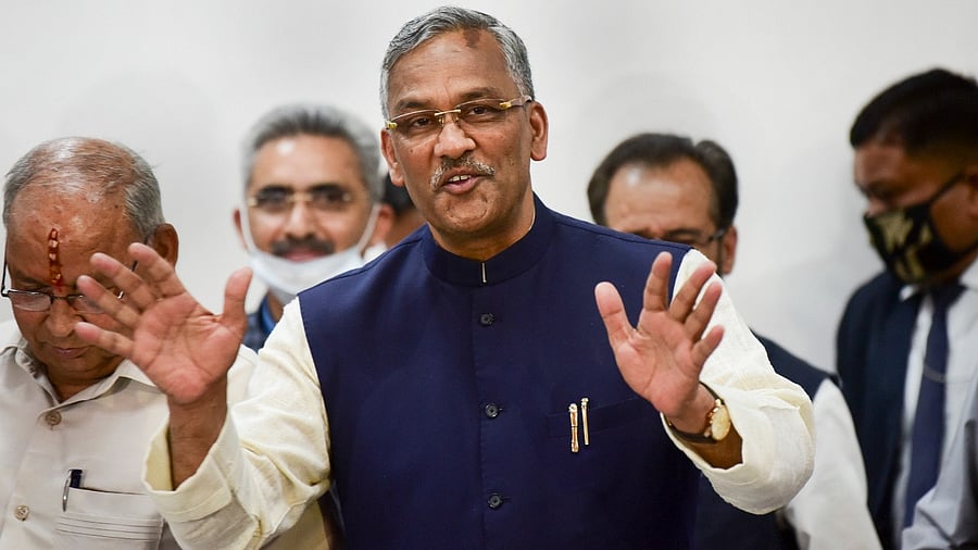 Uttarakhand Chief Minister Trivendra Singh Rawat addresses a press conference after tendering his resignation formally to Governor Baby Rani Maurya, in Dehradun. Credit: PTI Photo