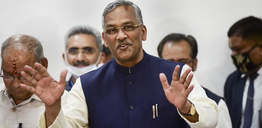 Uttarakhand Chief Minister Trivendra Singh Rawat addresses a press conference after tendering his resignation formally to Governor Baby Rani Maurya, in Dehradun. Credit: PTI photo.