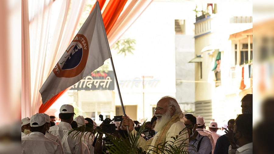 India's Prime Minister Narendra Modi (C) flags off Dandi March (Salt March) to commemorate the country's 75th year of independence, in Ahmedabad on March 12, 2021. Credit: AFP Photo