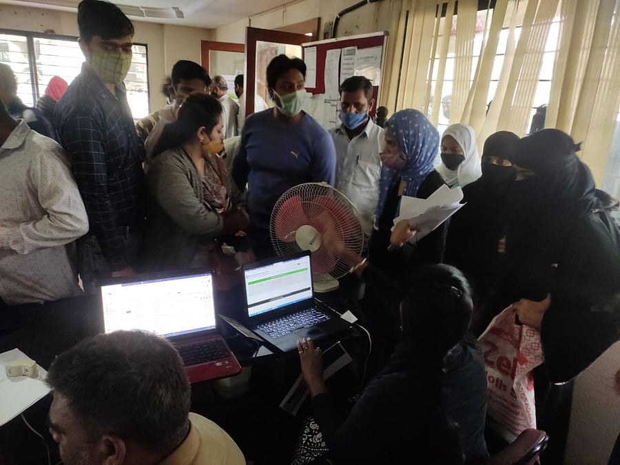 IMA depositors filing their claims at Nehru School near Coles Park.