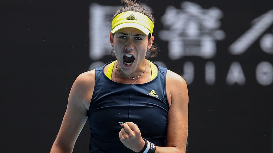 Garbine Muguruza reacts after a point against Japan's Naomi Osaka during their women's singles match on day seven of the Australian Open tennis tournament in Melbourne. Credit: AFP Photo