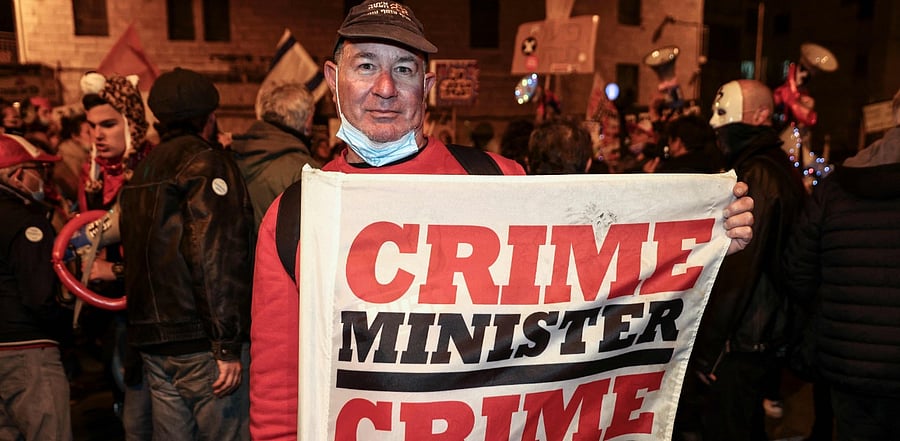 Erez Yalon, a disabled Israeli, for nearly a year has dedicated his life to protesting outside Netanyahu's residence. Credit: AFP Photo