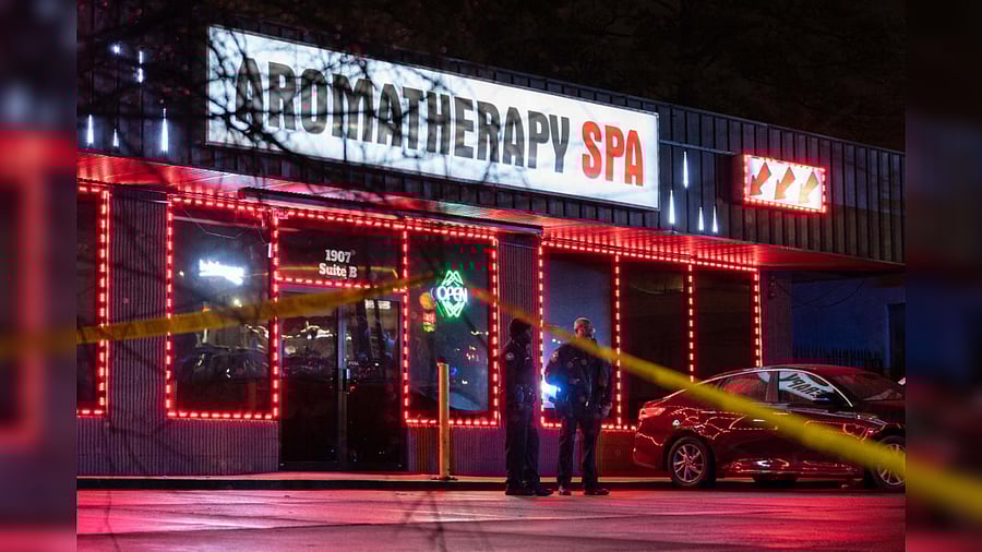 Law enforcement personnel are seen outside a massage parlor where a person was shot and killed on March 16, 2021, in Atlanta, Georgia. Credit: AFP Photo