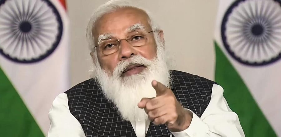 Narendra Modi speaks during a meeting with chief ministers of all states and Union territories over the spike in Covid-19 cases, via video conferencing, in New Delhi, Wednesday, March 17, 2021. Credit: PTI Photo