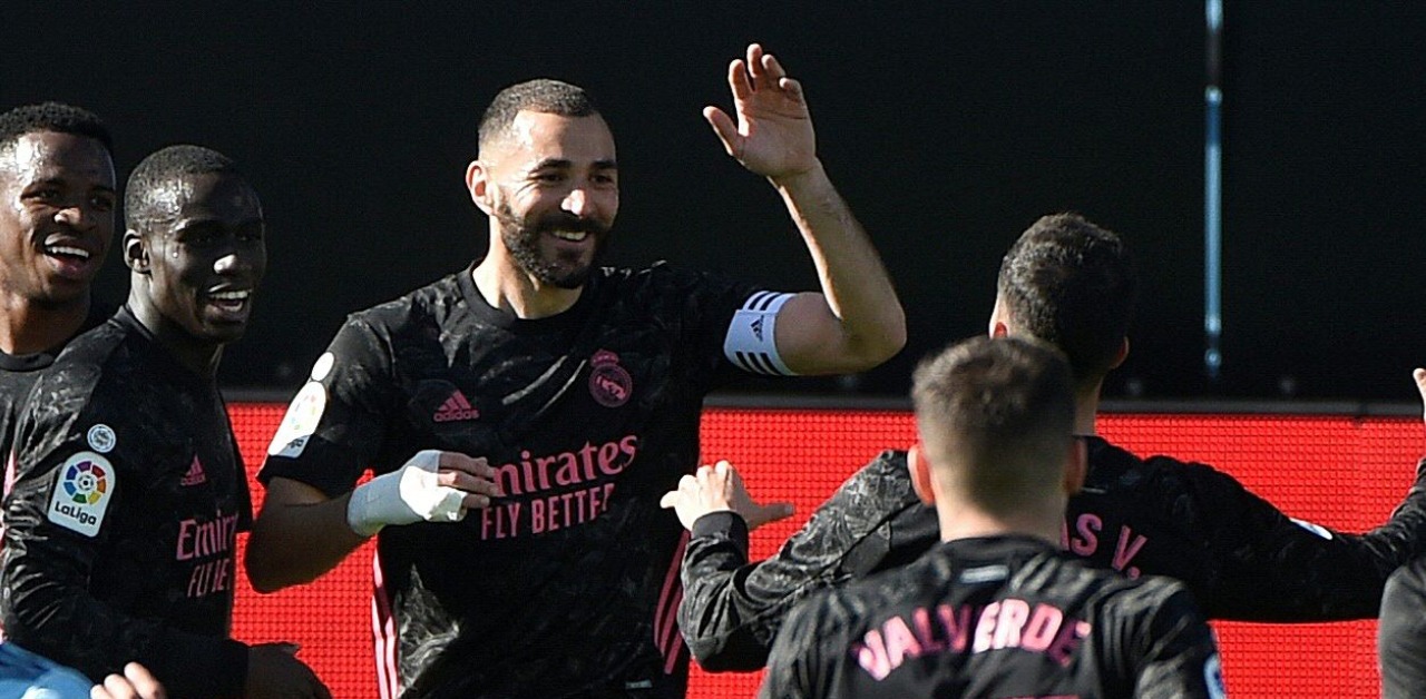 Benzema celebrating with his teammates after scoring. Credit: AFP Photo